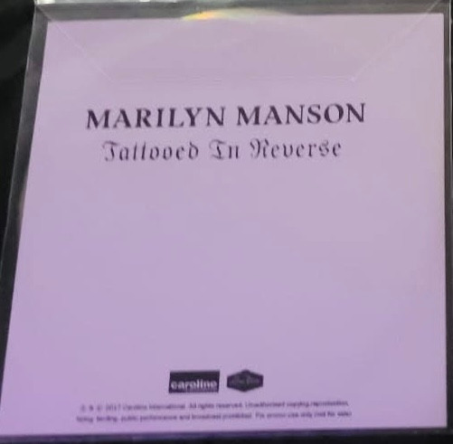 Capa de Tattooed in Reverse